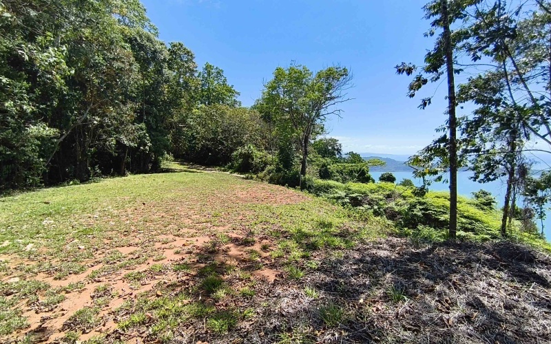 Golfito real estate, Golfo Dulce ocean view land, titled property Costa Rica, luxury development Golfito, off-grid solar land, Cielo Lodge road property, Costa Rica boutique hotel site