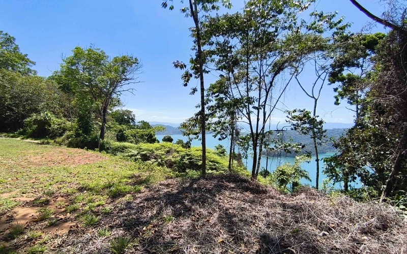 Golfito real estate, Golfo Dulce ocean view land, titled property Costa Rica, luxury development Golfito, off-grid solar land, Cielo Lodge road property, Costa Rica boutique hotel site