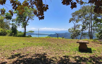 Golfito real estate, Golfo Dulce ocean view land, titled property Costa Rica, luxury development Golfito, off-grid solar land, Cielo Lodge road property, Costa Rica boutique hotel site