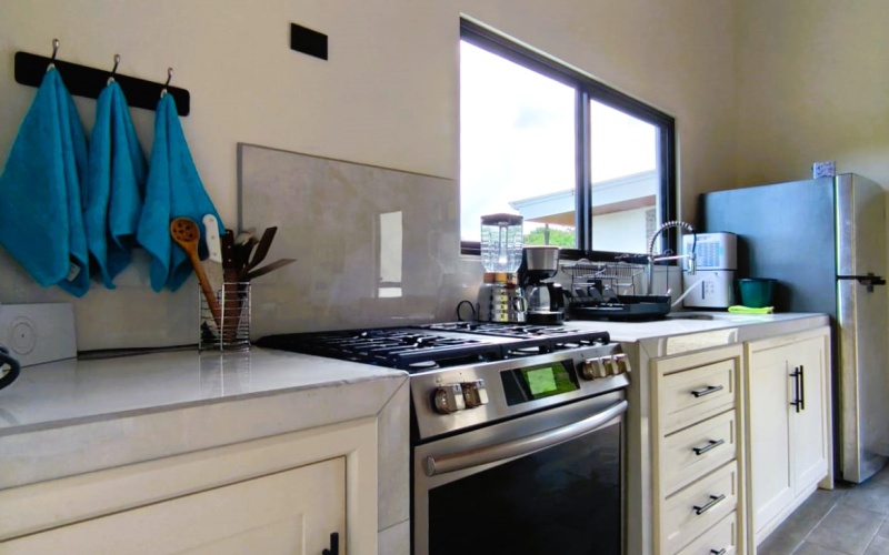 Pavones real estate, Altamira homes for sale, Costa Rica solar powered home, brand new house Pavones, Golfo Dulce property, 2 bedroom house Pavones, off grid capable home Costa Rica.