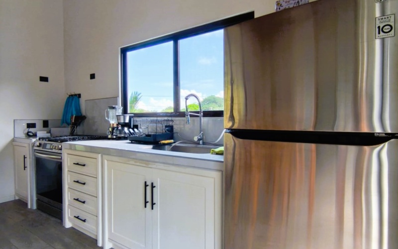 Pavones real estate, Altamira homes for sale, Costa Rica solar powered home, brand new house Pavones, Golfo Dulce property, 2 bedroom house Pavones, off grid capable home Costa Rica.