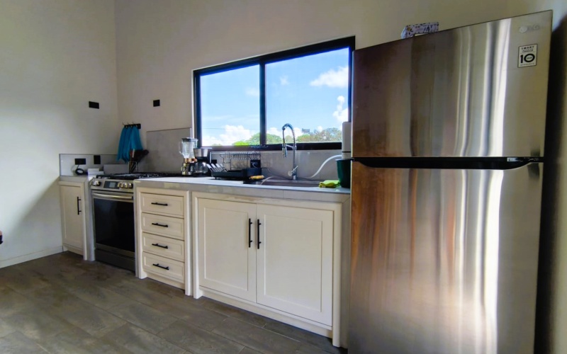 Pavones real estate, Altamira homes for sale, Costa Rica solar powered home, brand new house Pavones, Golfo Dulce property, 2 bedroom house Pavones, off grid capable home Costa Rica.