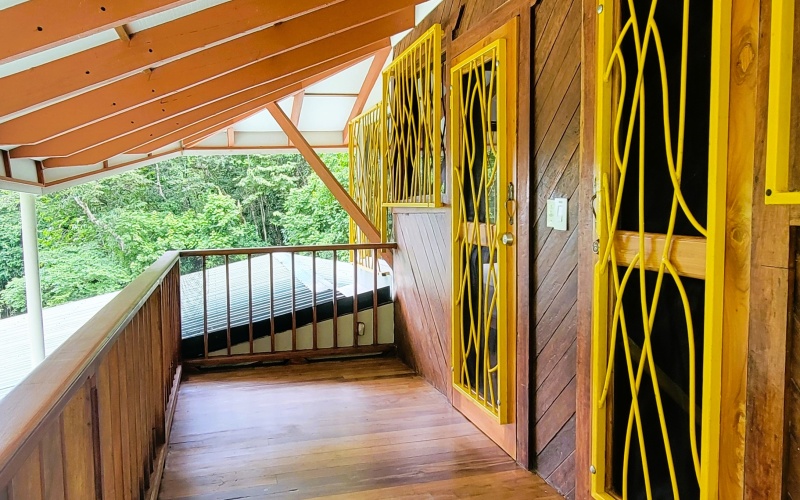 Door from the stairs leads to door with bedrooms